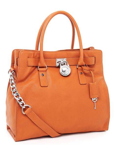 michael kors orange tote mk monogram tan shoulder strap|designer large orange purses handbags.